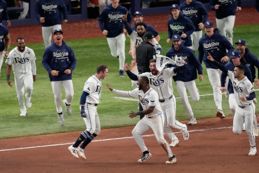 Tampa Bay comes back in the 12th inning to extend the World Series ...