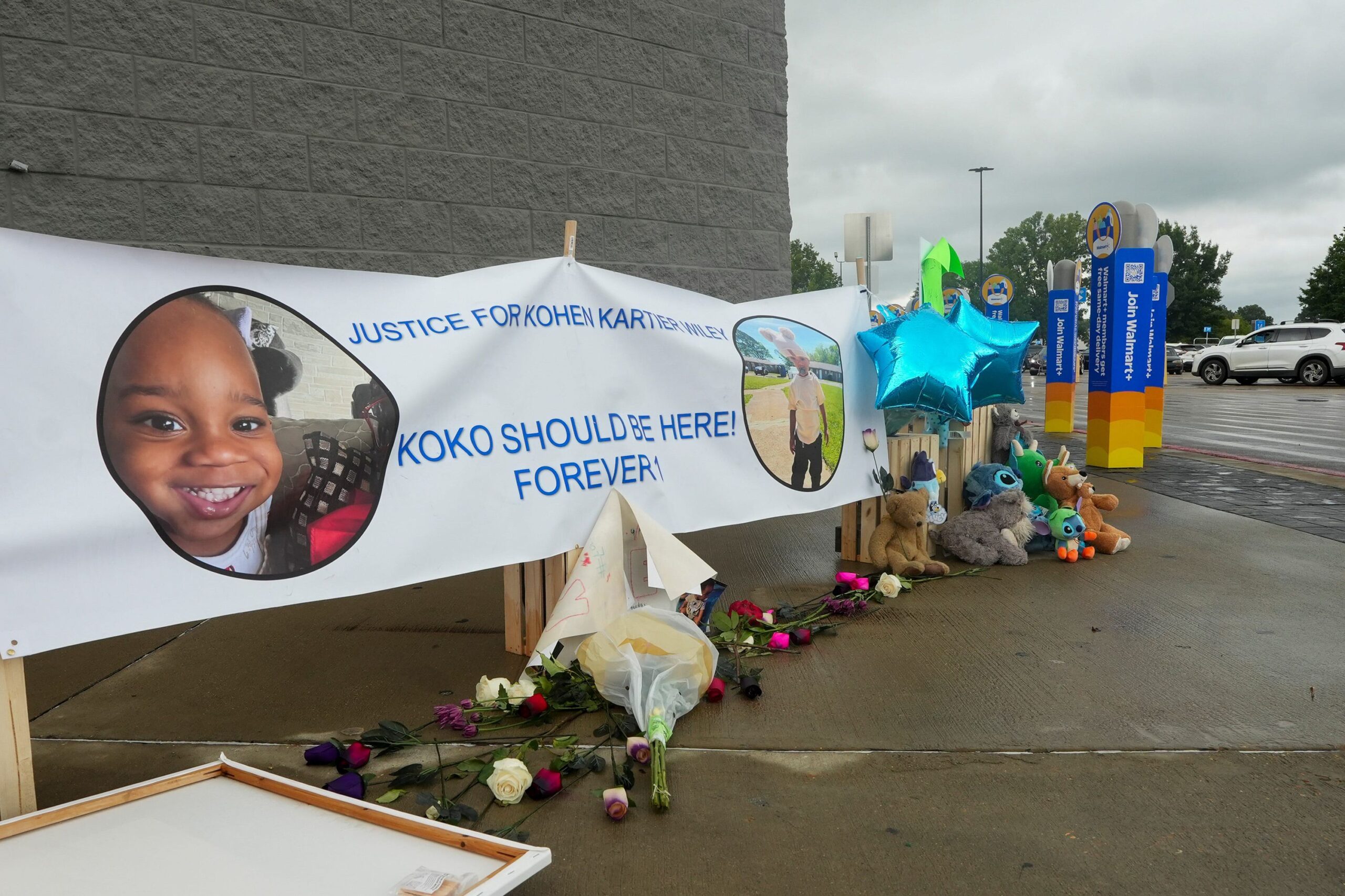 A memorial to Kohen Wiley is seen outside of a Walmart in Senatobia